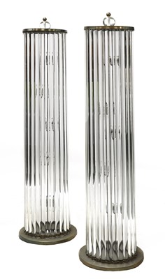 Lot 682 - A pair of glass standard lamps