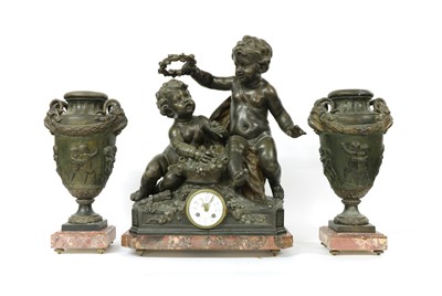 Lot 238 - A large spelter clock garniture