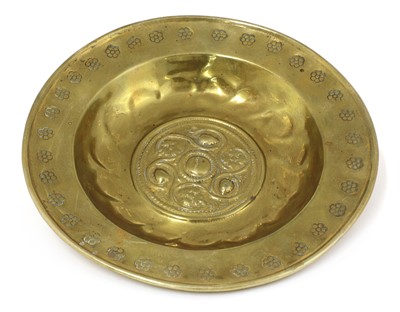 Lot 139 - A small brass alms dish
