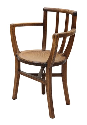 Lot 91 - An Arts and Crafts oak armchair
