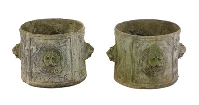 Lot 385 - A pair of circular lead planters
