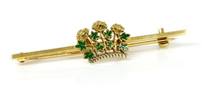 Lot 131 - A cased 9ct gold enamel Royal Society of Medicine bar brooch, by Garrard & Co. Ltd.
