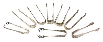 Lot 822 - A pair of George III silver sugar tongs