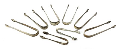 Lot 827 - A pair of George III silver sugar tongs
