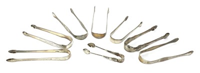 Lot 825 - A pair of George III silver sugar tongs