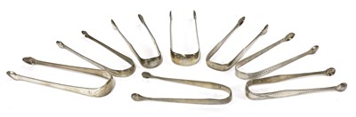 Lot 821 - A pair of George III silver sugar tongs
