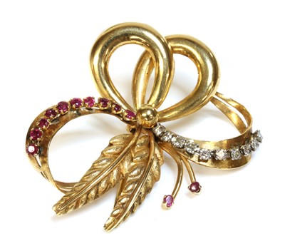 Lot 202 - An Italian gold ruby and diamond bow spray brooch, c.1950