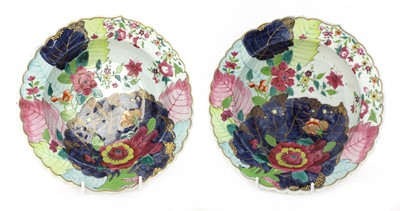 Lot 273 - A pair of English pottery 'tobacco leaf' dishes