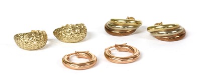 Lot 190 - A pair of rose gold round twisted wire hollow hoop earrings