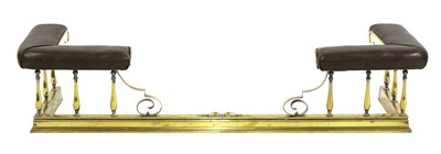 Lot 307 - A brass club fender