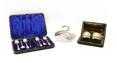 Lot 7 - A pair of cased silver napkin rings