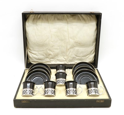Lot 80 - A cased set of Shelley England noir coffee cups and saucers
