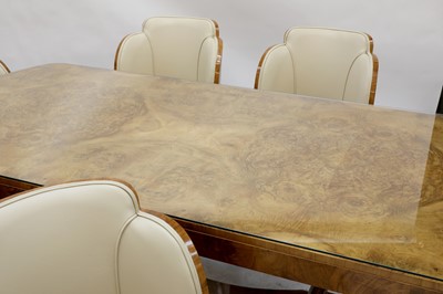 Lot 189 - An Art Deco burr walnut dining suite