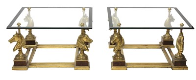 Lot 795 - A pair of brass coffee tables
