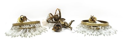 Lot 97A - A pair of cut glass and brass chandeliers of three waterfall graduated tiers