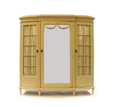 Lot 322 - An early 20th century cream painted mahogany armoire