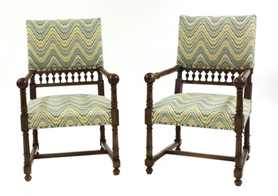 Lot 163 - A pair of walnut armchairs