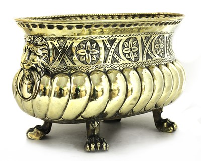 Lot 148 - A repoussé brass wine cooler/jardinière