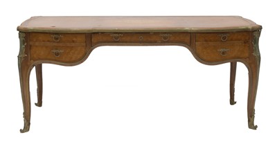 Lot 48 - Eugène Dienst, after Jean-François Oeben, a Louis XV-style kingwood bureau plat