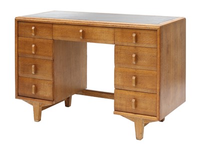Lot 397 - An Heal's oak desk