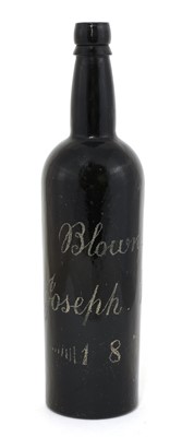 Lot 736 - A blue glass wine bottle