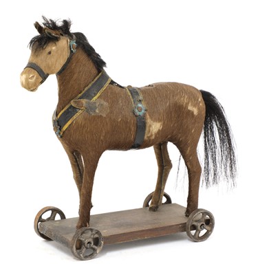 Lot 744 - A miniature ponyskin toy pony
