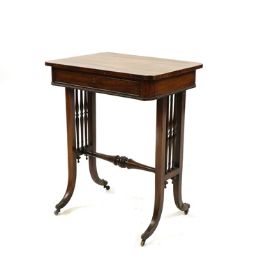 Lot 231 - A George IV rosewood work table in the manner of Gillows