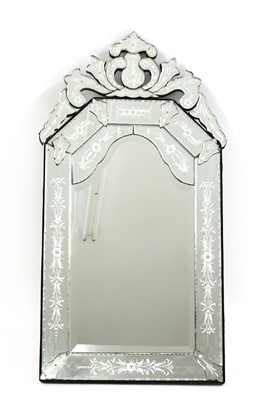 Lot 259 - A Venetian cut and etched glass mirror