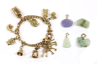 Lot 49 - A 9ct gold charm bracelet