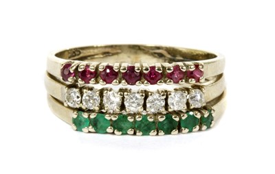 Lot 117 - A white gold ruby, diamond and emerald ring