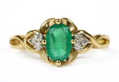 Lot 104 - A 9ct gold emerald and diamond ring