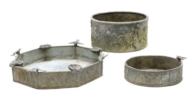 Lot 402 - An octagonal lead birdbath