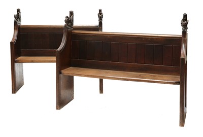 Lot 147 - A near pair of oak church pews