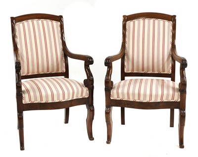 Lot 179 - A pair of French Louis Philippe mahogany open armchairs