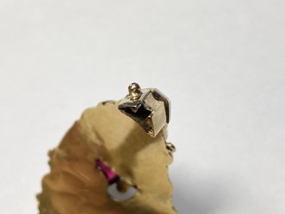 Lot 3 - A Swedish gold paste, split pearl and enamel hollow hinged bangle, c.1850