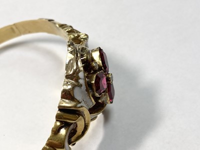 Lot 3 - A Swedish gold paste, split pearl and enamel hollow hinged bangle, c.1850