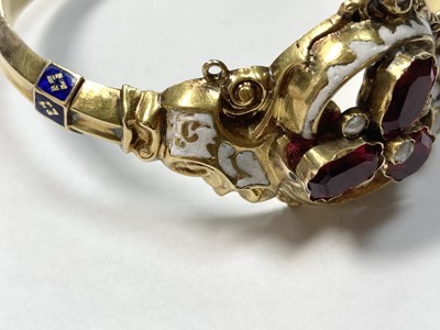 Lot 3 - A Swedish gold paste, split pearl and enamel hollow hinged bangle, c.1850