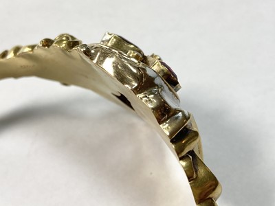 Lot 3 - A Swedish gold paste, split pearl and enamel hollow hinged bangle, c.1850