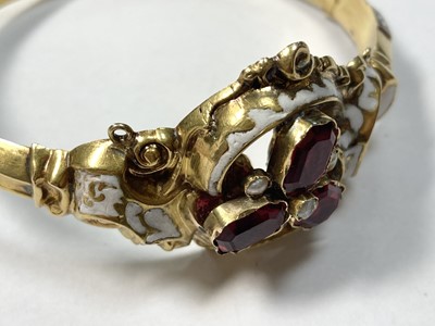 Lot 3 - A Swedish gold paste, split pearl and enamel hollow hinged bangle, c.1850