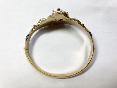 Lot 3 - A Swedish gold paste, split pearl and enamel hollow hinged bangle, c.1850