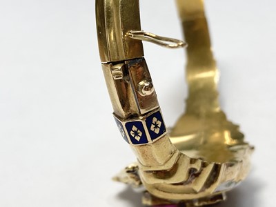 Lot 3 - A Swedish gold paste, split pearl and enamel hollow hinged bangle, c.1850