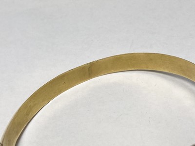 Lot 3 - A Swedish gold paste, split pearl and enamel hollow hinged bangle, c.1850