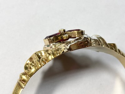 Lot 3 - A Swedish gold paste, split pearl and enamel hollow hinged bangle, c.1850