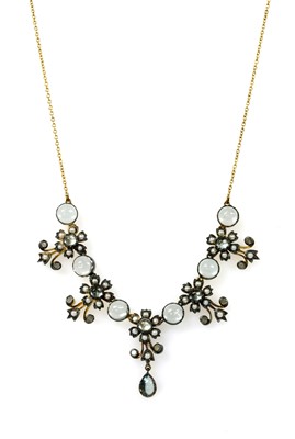 Lot 186 - A silver and gold, blue topaz, split pearl and diamond necklace