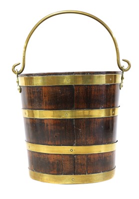 Lot 106 - A George III mahogany and brass bound peat bucket