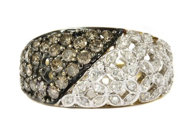 Lot 171 - A 9ct gold fancy brown and white diamond bombé cluster ring