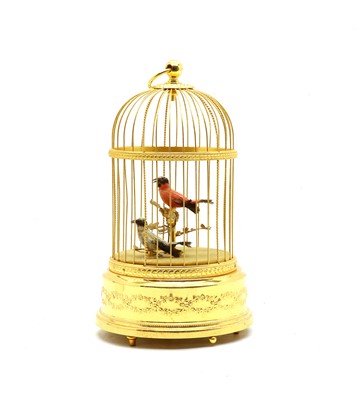 Lot 101 - A modern gilt singing birdcage music box