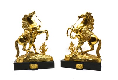 Lot 157 - A pair of polished bronze Marley horses