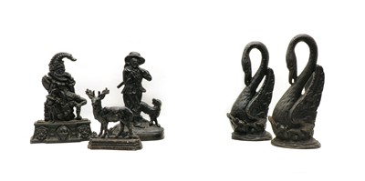 Lot 152 - Five iron door stops