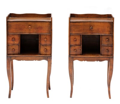 Lot 974 - A pair of French beech bedside tables